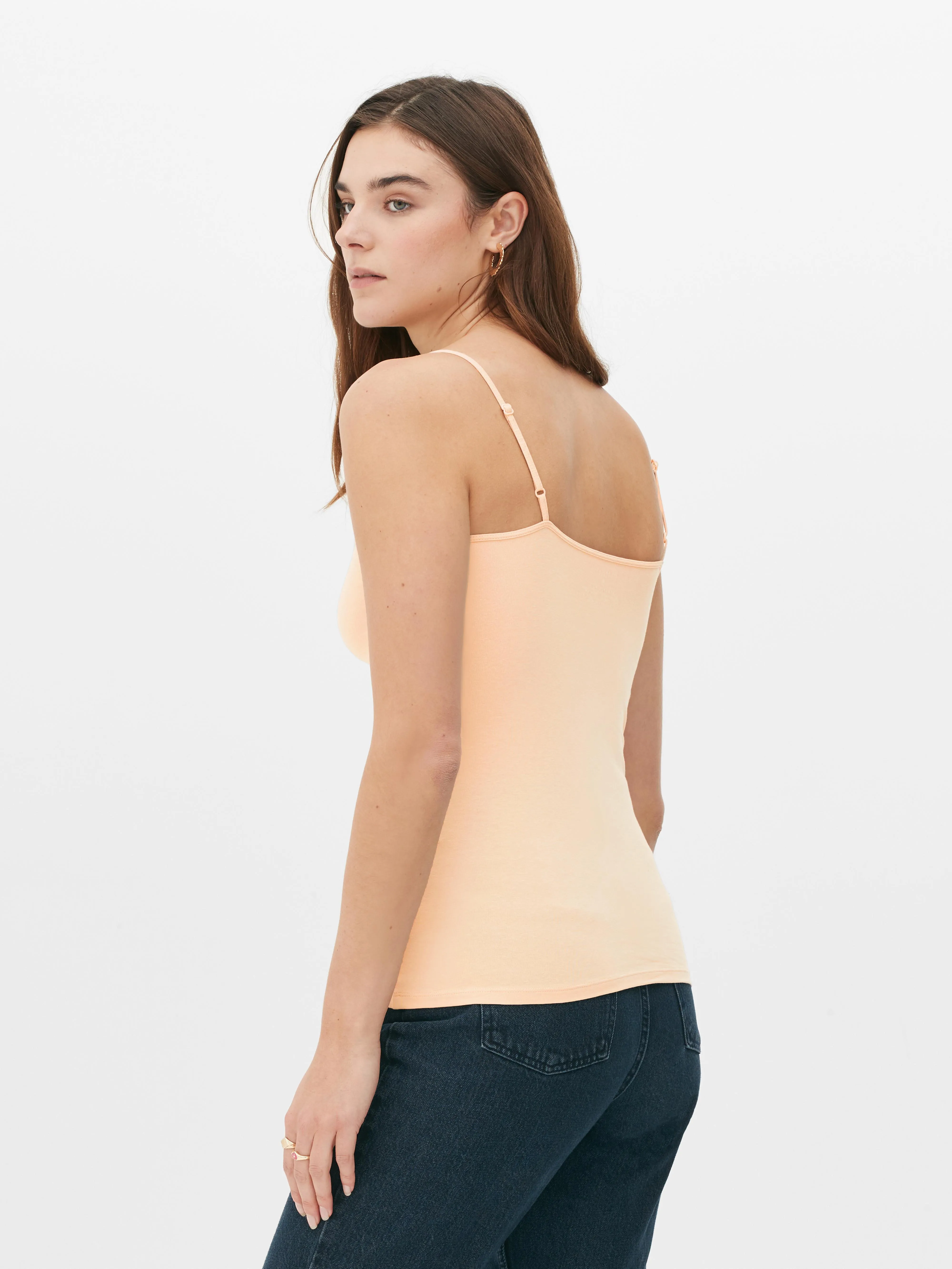 Camiseta elástica con tirantes ajustables