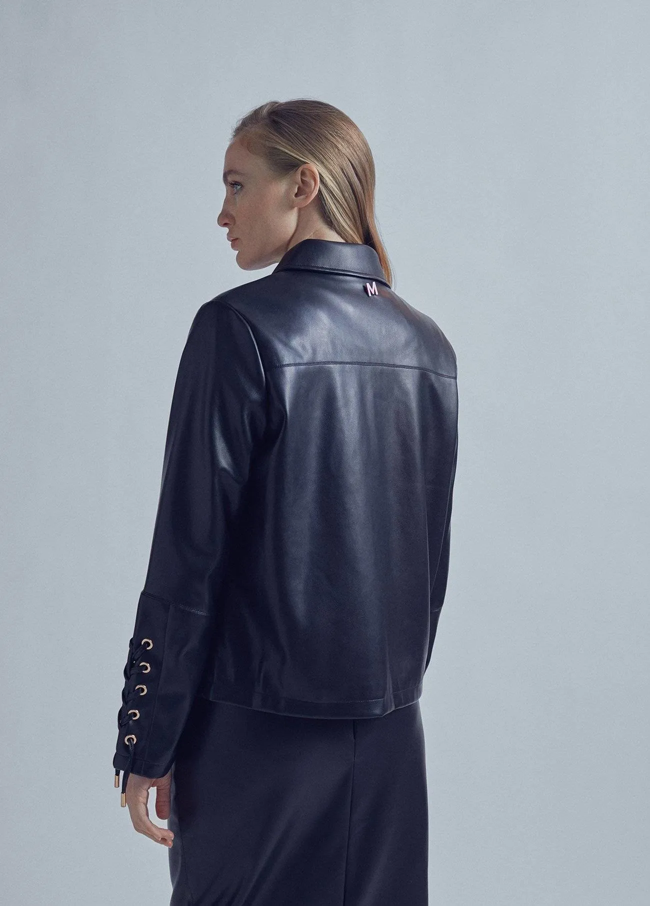 Chaqueta detalle piel eyelets negra Lola Casademunt