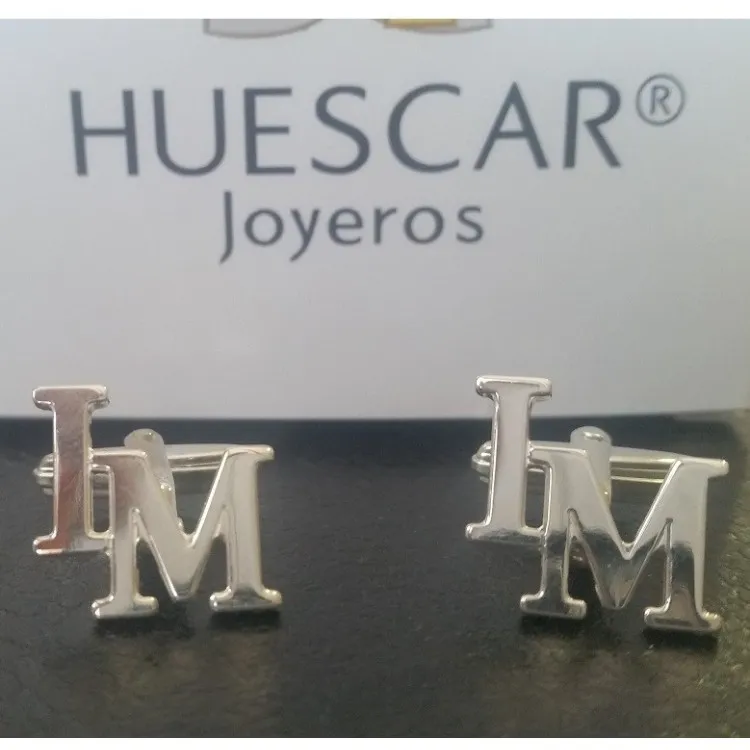Gemelos iniciales desplazadas en paralelo plata de ley