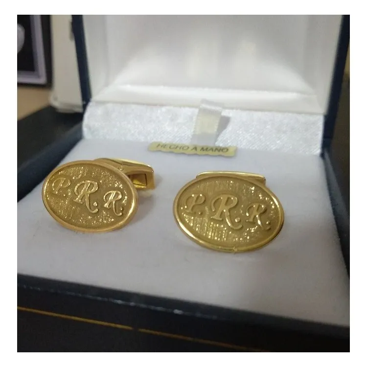 Gemelos ovalados alto relieve plata de ley