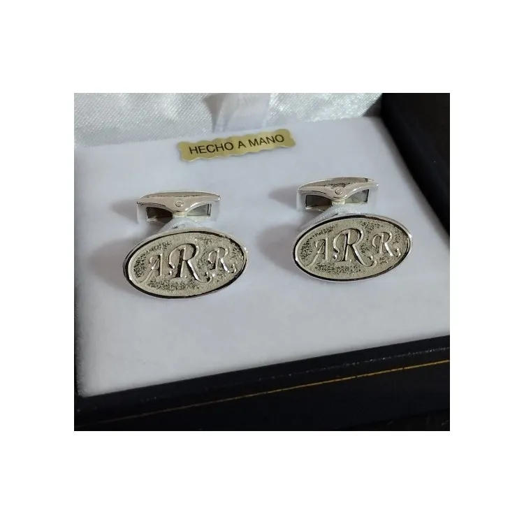 Gemelos ovalados alto relieve plata de ley