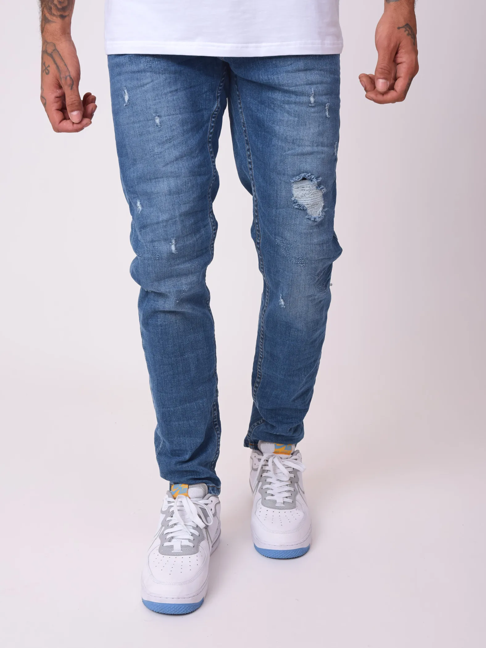 Jeans rectos desgastados