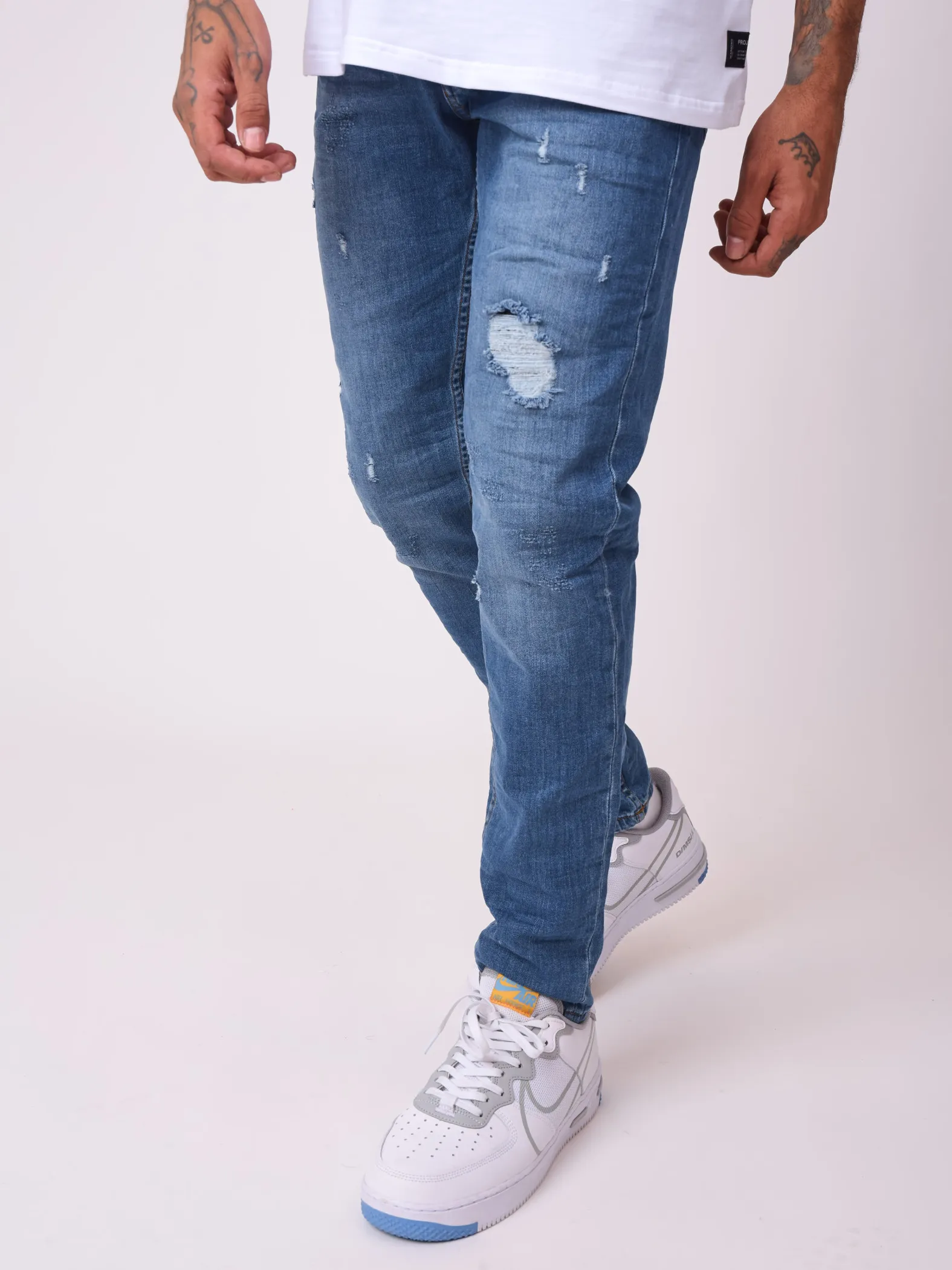 Jeans rectos desgastados