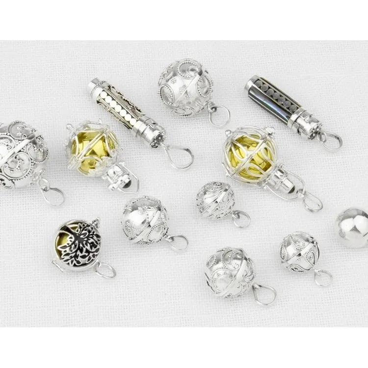Llamador de angel en plata 12 MM con bola interior de metal. Incluye cadena