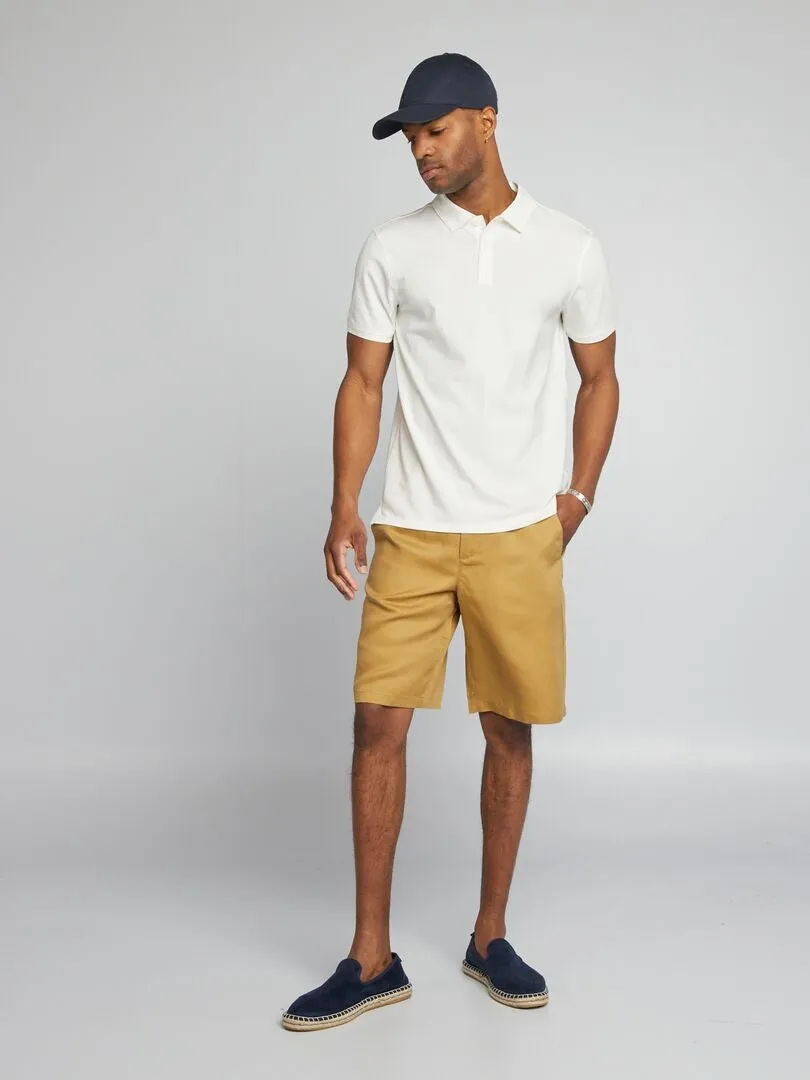 POLO ELáSTICO SLIM FIT  BLANCO
